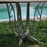 Sheet metal and iron garden table
