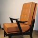 Paire de fauteuils vintage années 50 en bois noir et cuir caramel