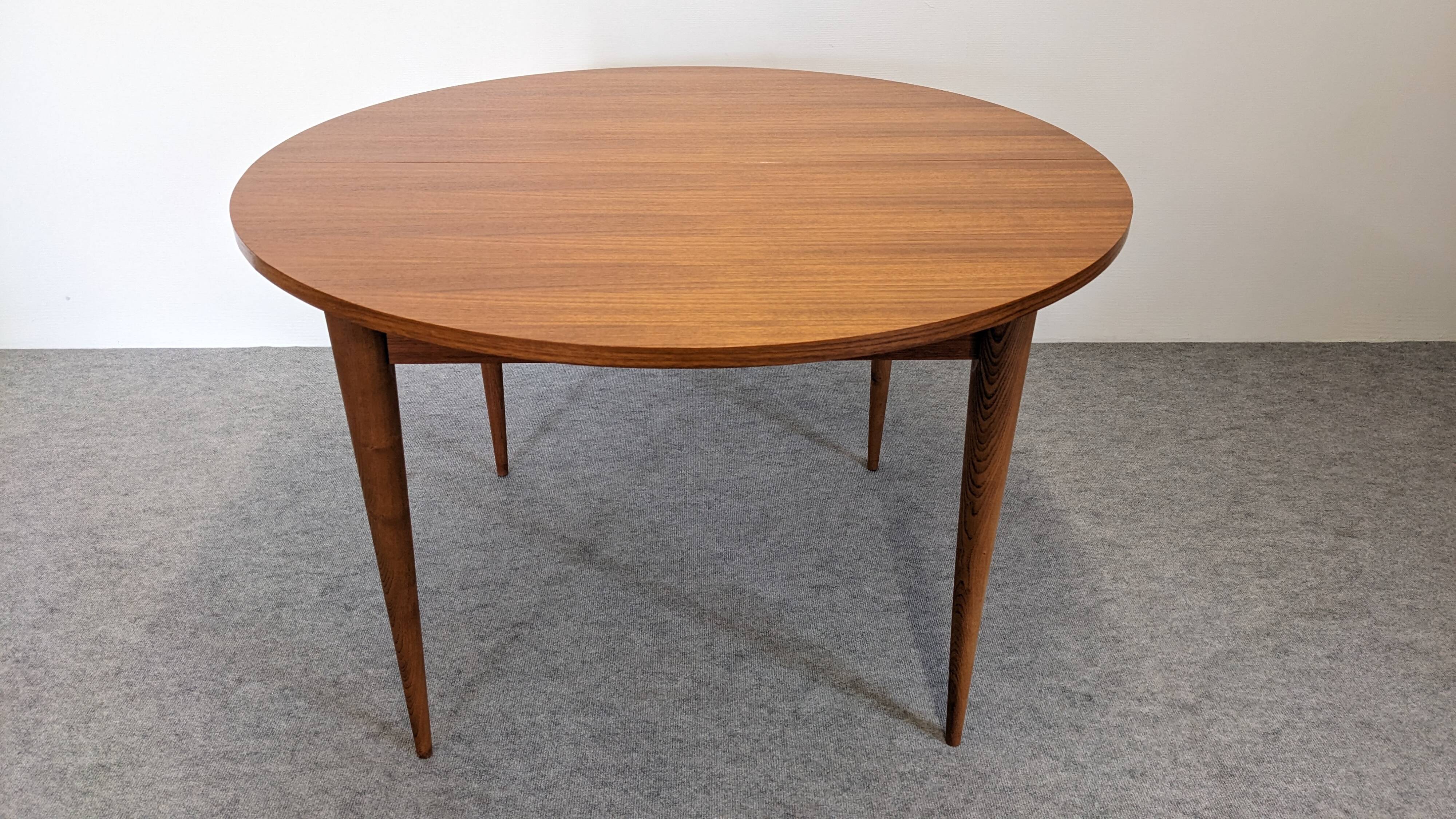 Extendable round table in Scandinavian style made of teak, France circa 1960.