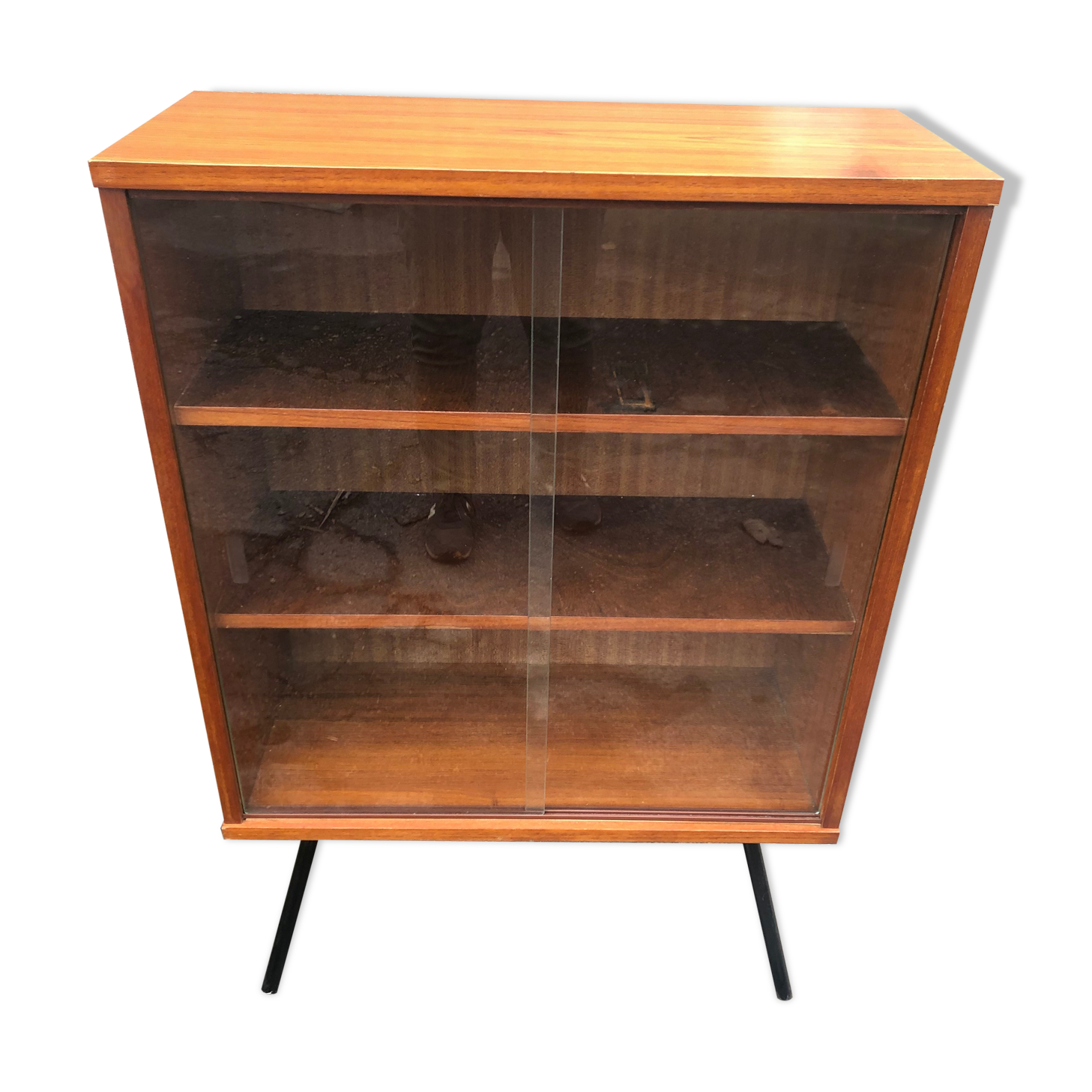 Library showcase with sliding glass doors 60s