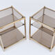 Pair of sofa tips in gilded metal and glass
