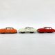 3 old small tin circuit cars with lead wheels • Vintage • 1960s