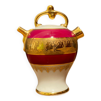 Miniature jug in Limoges porcelain gilded decoration on white and burgundy background