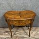 Louis XV style dressing table in "kidney" shape in rosewood decorated with marquetry flowers