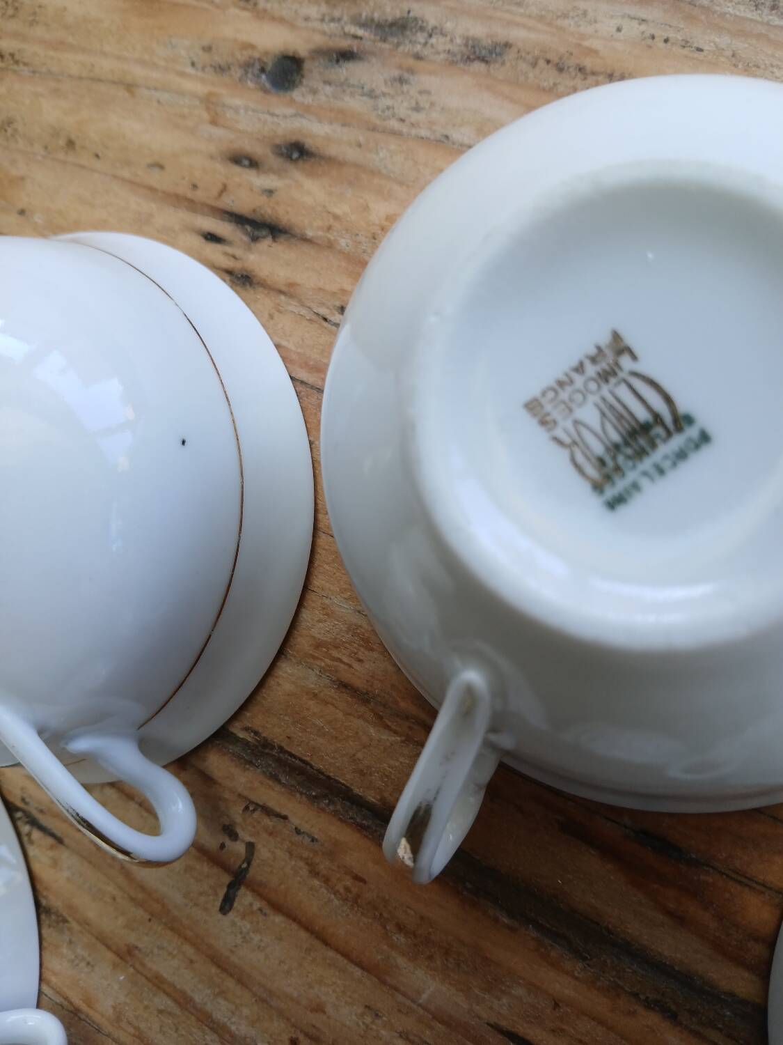 Set of 7 Limoges porcelain cups and saucers