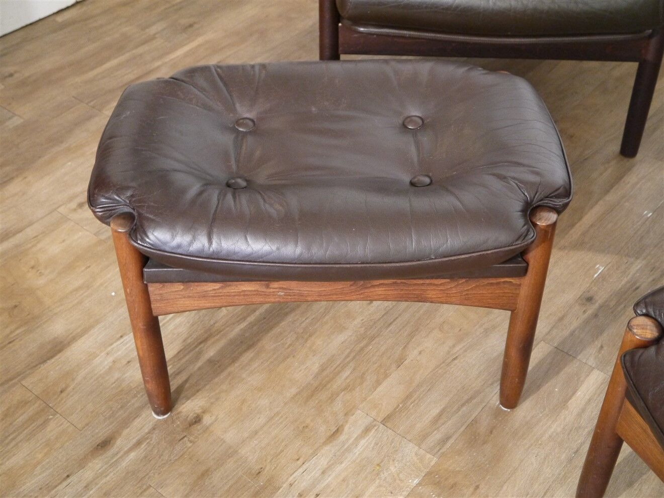 Pair of Scandinavian leather armchairs with ottomans 1970