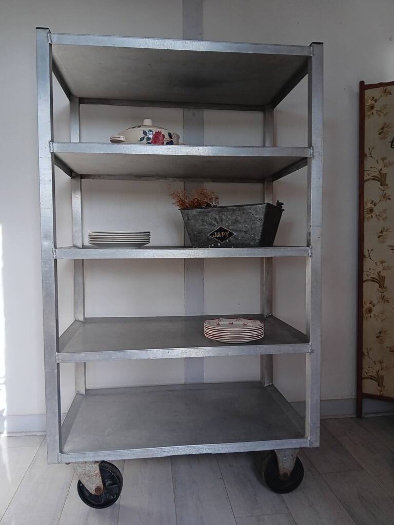 1950s metal shelf on wheels