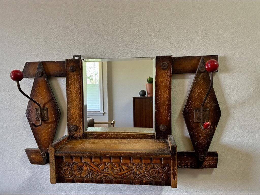 Wall cabinet with coat rack