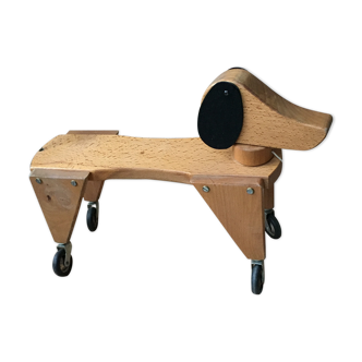 Wooden dog on wheels to shoot