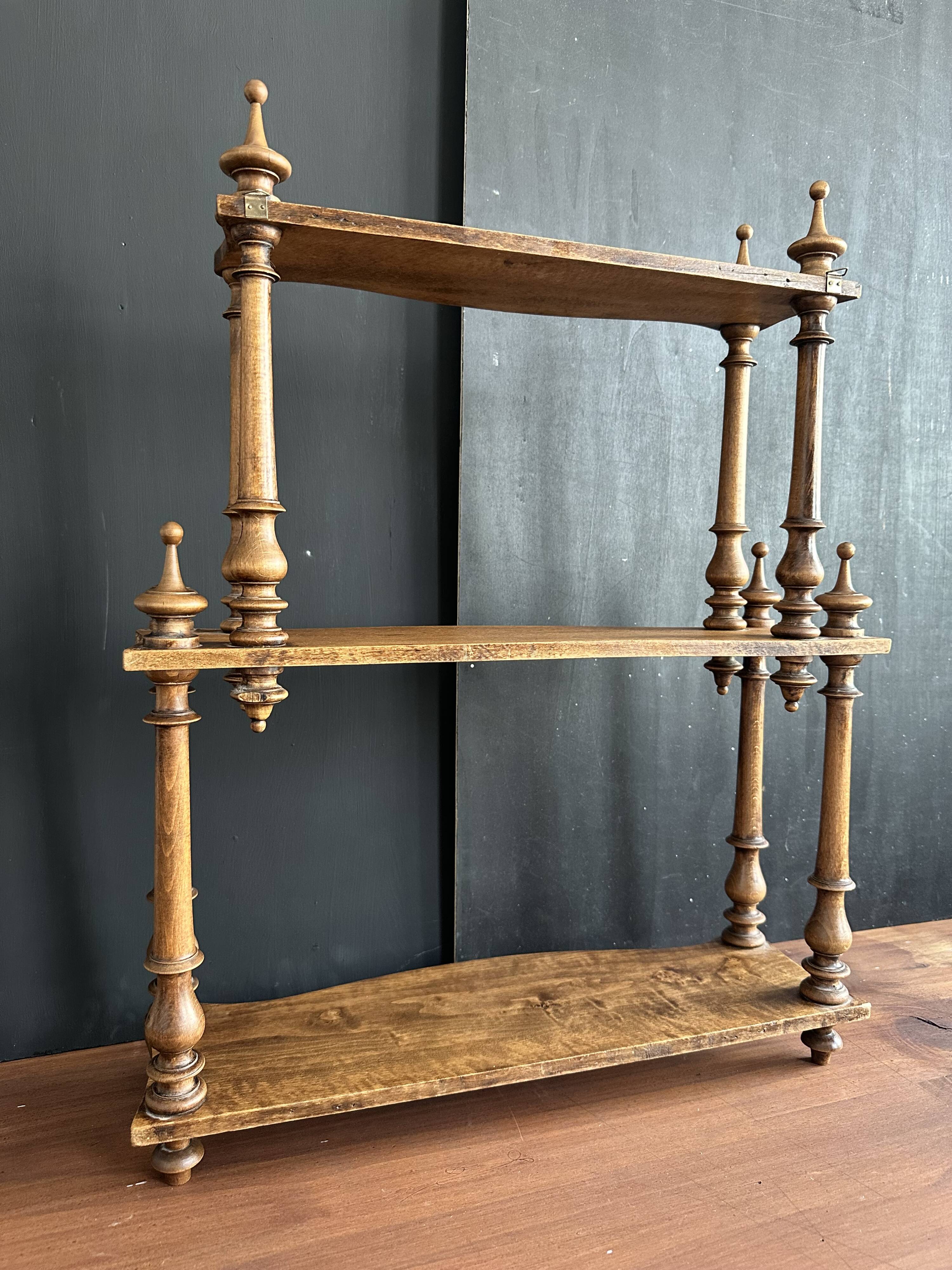 Antique turned wooden shelf with three levels, around 1900.