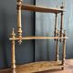 Antique turned wooden shelf with three levels, around 1900.