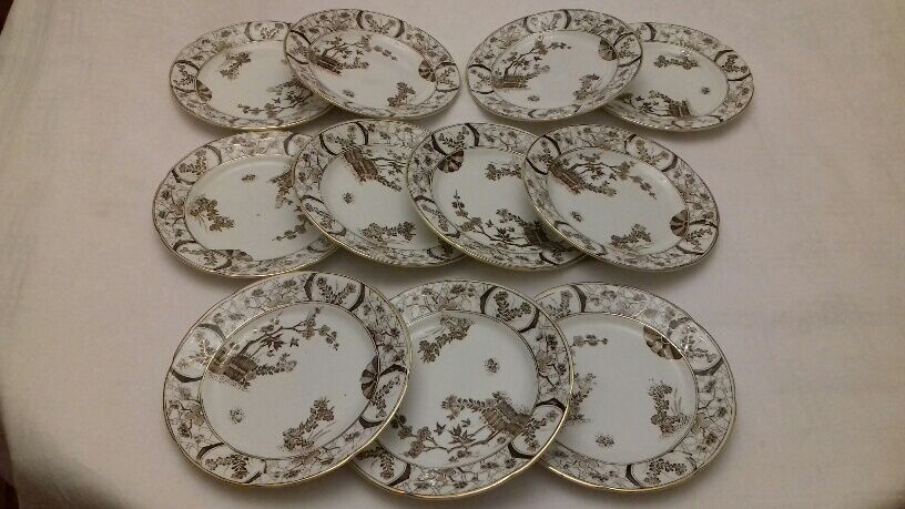 Set of 11 plates and 11 earthenware cups