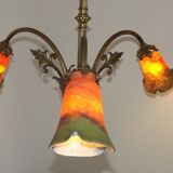 Art Nouveau three-light chandelier in bronze with orange and green glass shade, France.