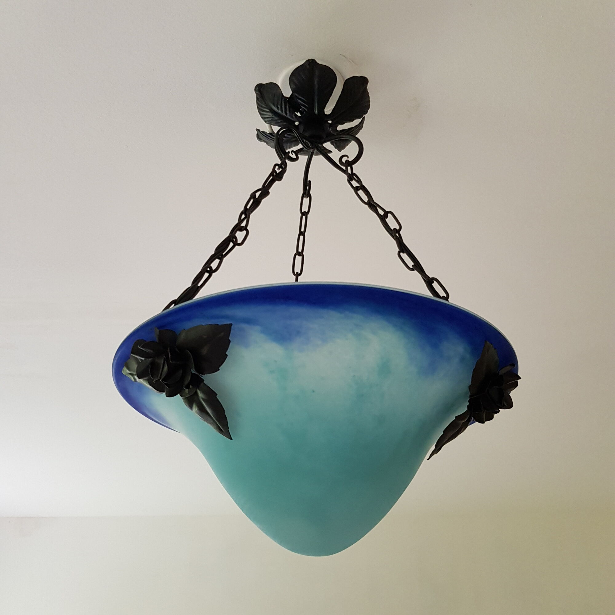 Blue glass paste and wrought iron basin suspension