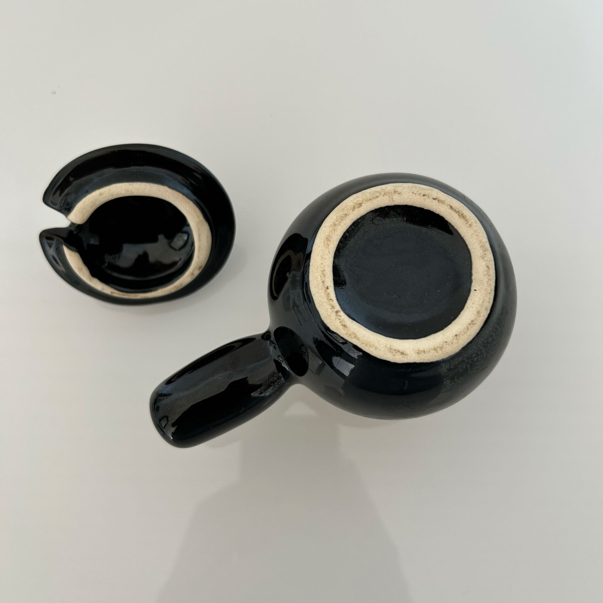 Blue flamed and black condiment pot