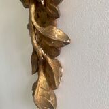 Carved wall lamp in wood of the seventeenth century