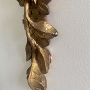 Carved wall lamp in wood of the seventeenth century