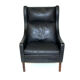 Fauteuil en cuir et palissandre Danemark 1960