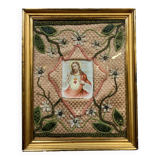 Broderie religieuse du XIXeme siècle : tableau ex voto avec une image pieuse