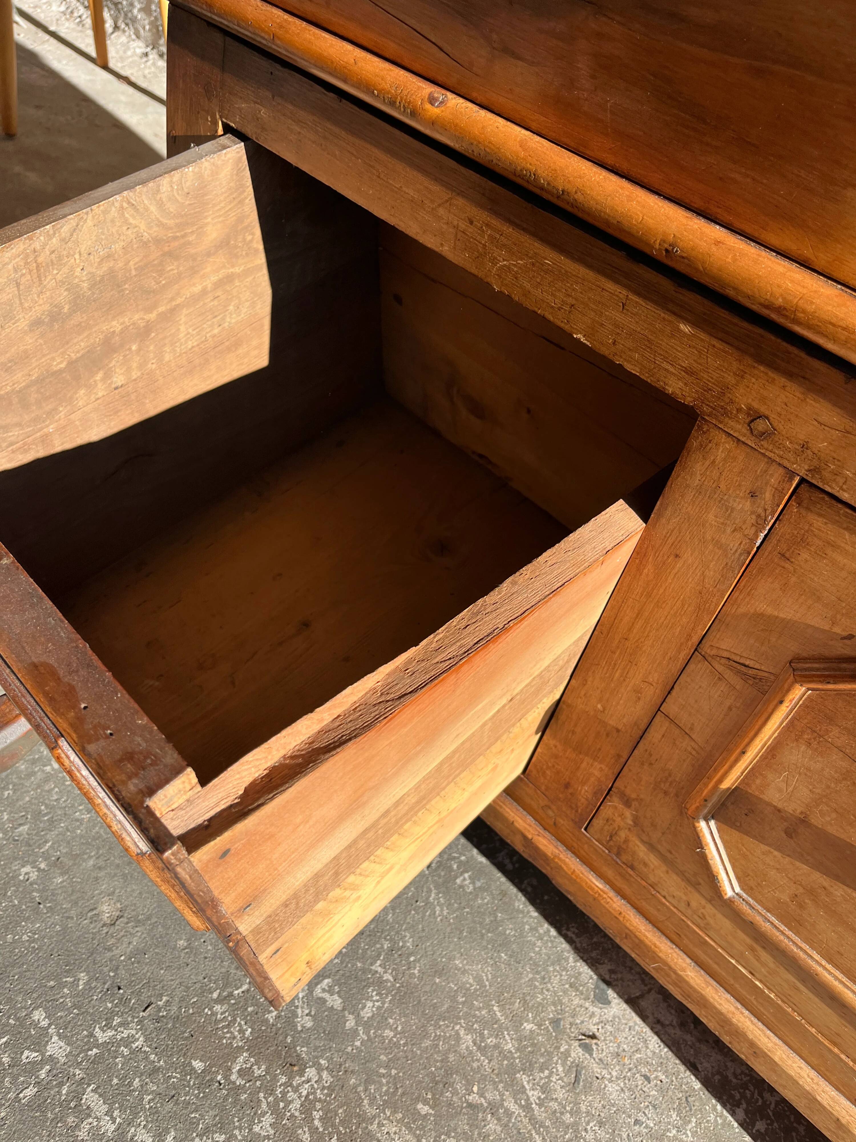 Old wooden baker's chest with storage drawers