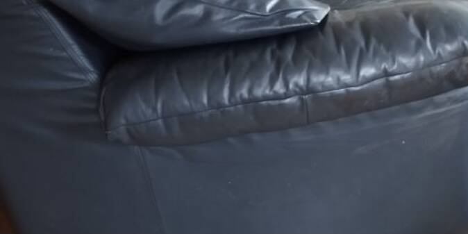 Gerard Guermonprez black leather sofa, cocooning sofa