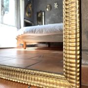 Antique Napoleon III gilded mirror from the 19th century.