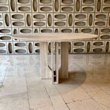 Round travertine dining table with double cross foot