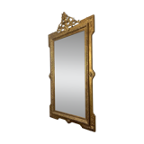 Antique Louis XVI style mirror in gilded wood
