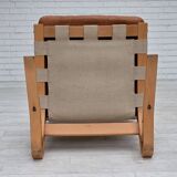 Fauteuil norvégien des années 1970, modèle "Kengu", cuir de meuble.