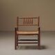 Wicker armchair in solid wood, handcrafted, France, around 1950.