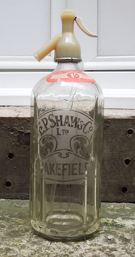 Old transparent glass siphon: EP. Shaw & Co Ltd – Wakefield