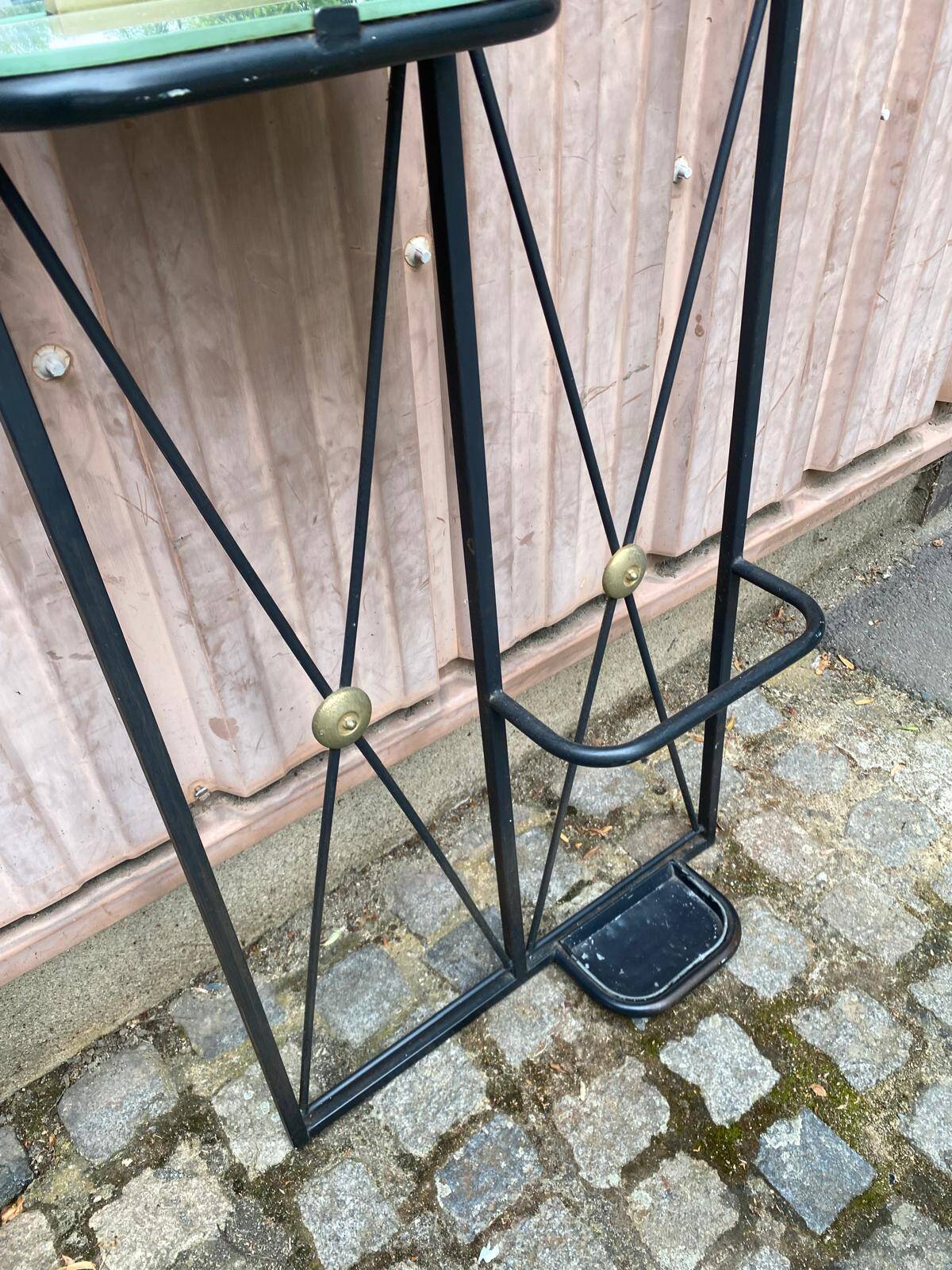Mid-Century Modern wall coat rack from the 1950s.