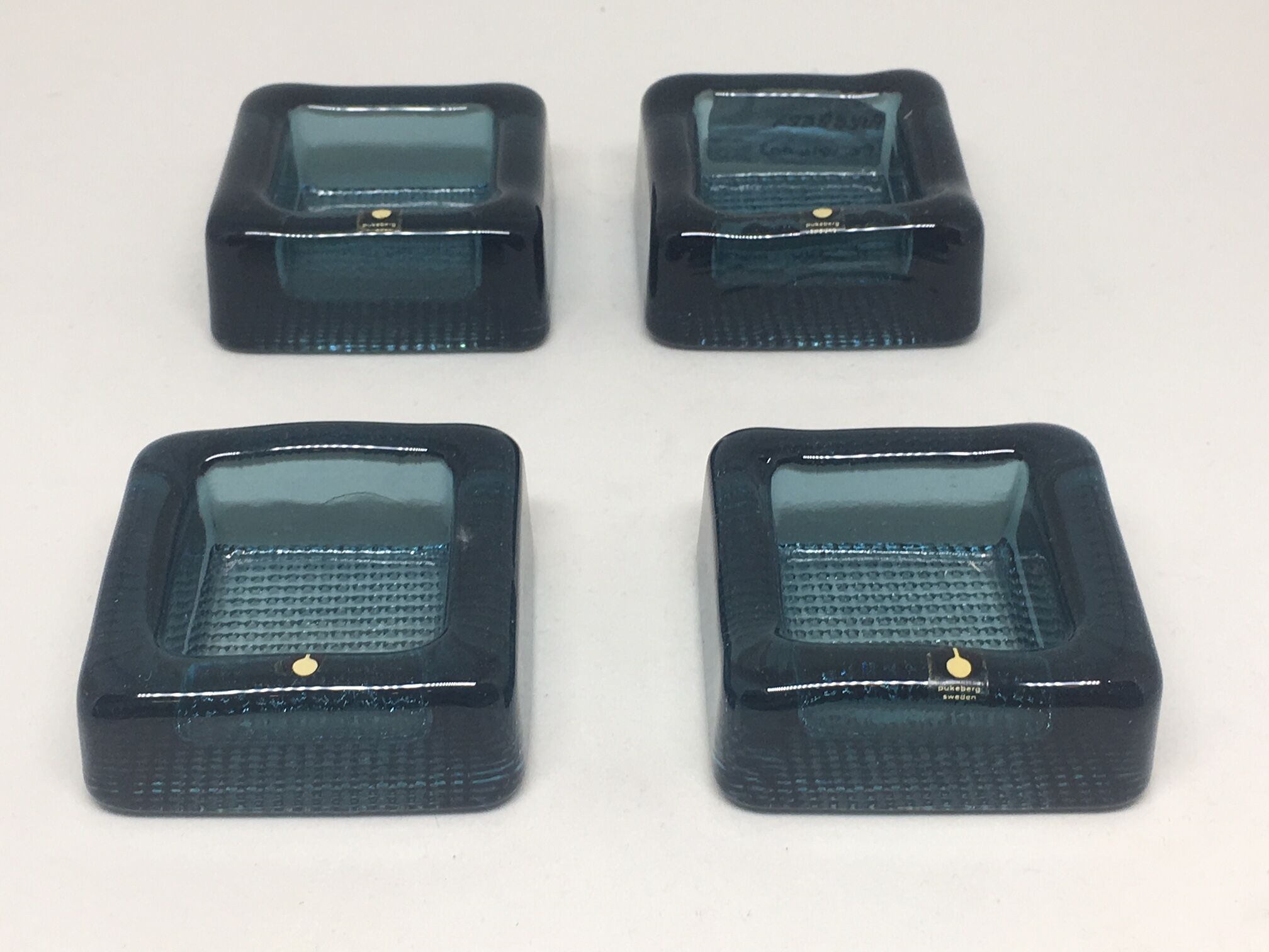 Set of 4 ashtrays Pukeberg