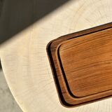 Trio of rounded rectangular trays or cups in monoxyl teak L:35