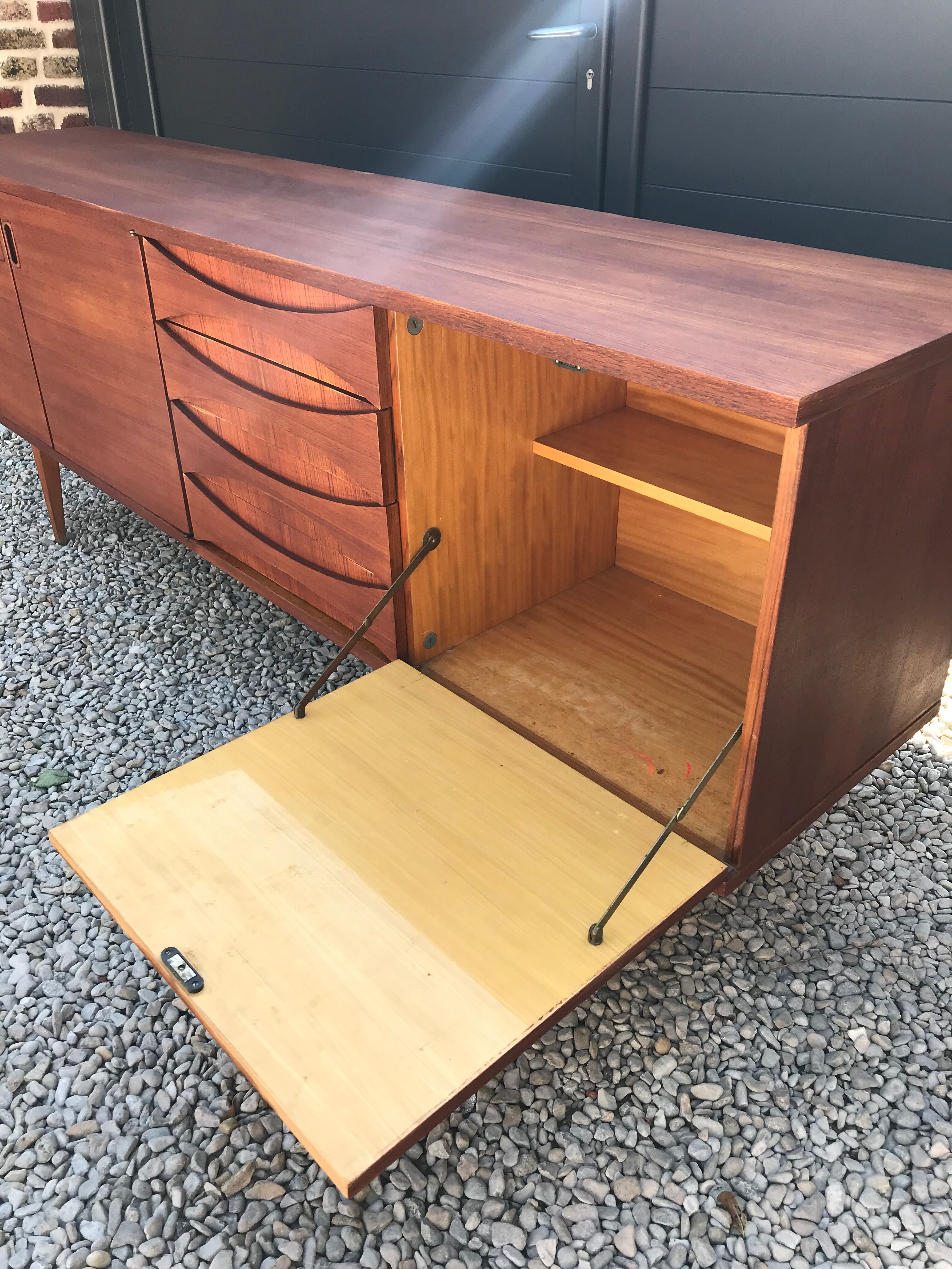 Eros row in scandinavian design teak