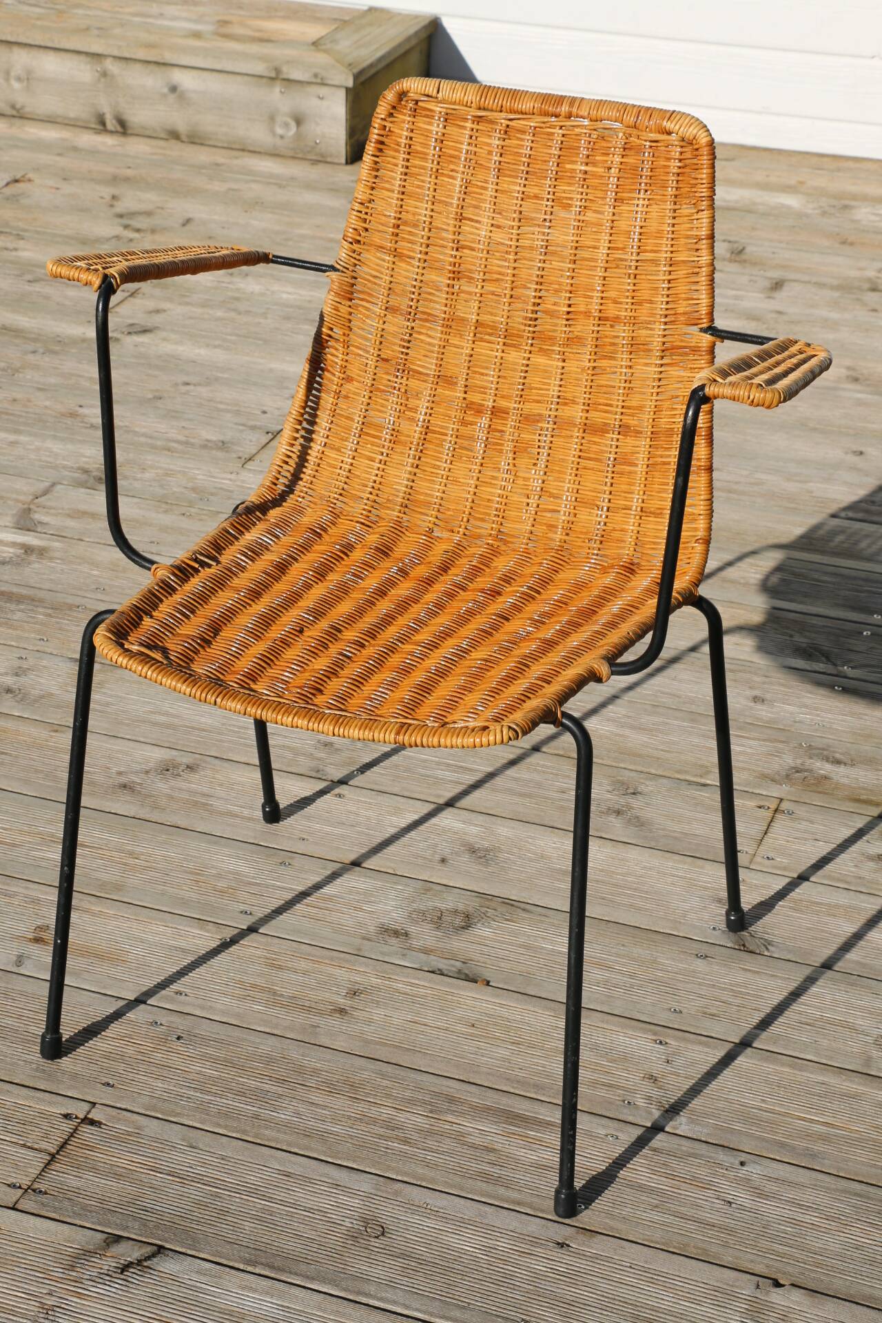 Rattan and steel armchair