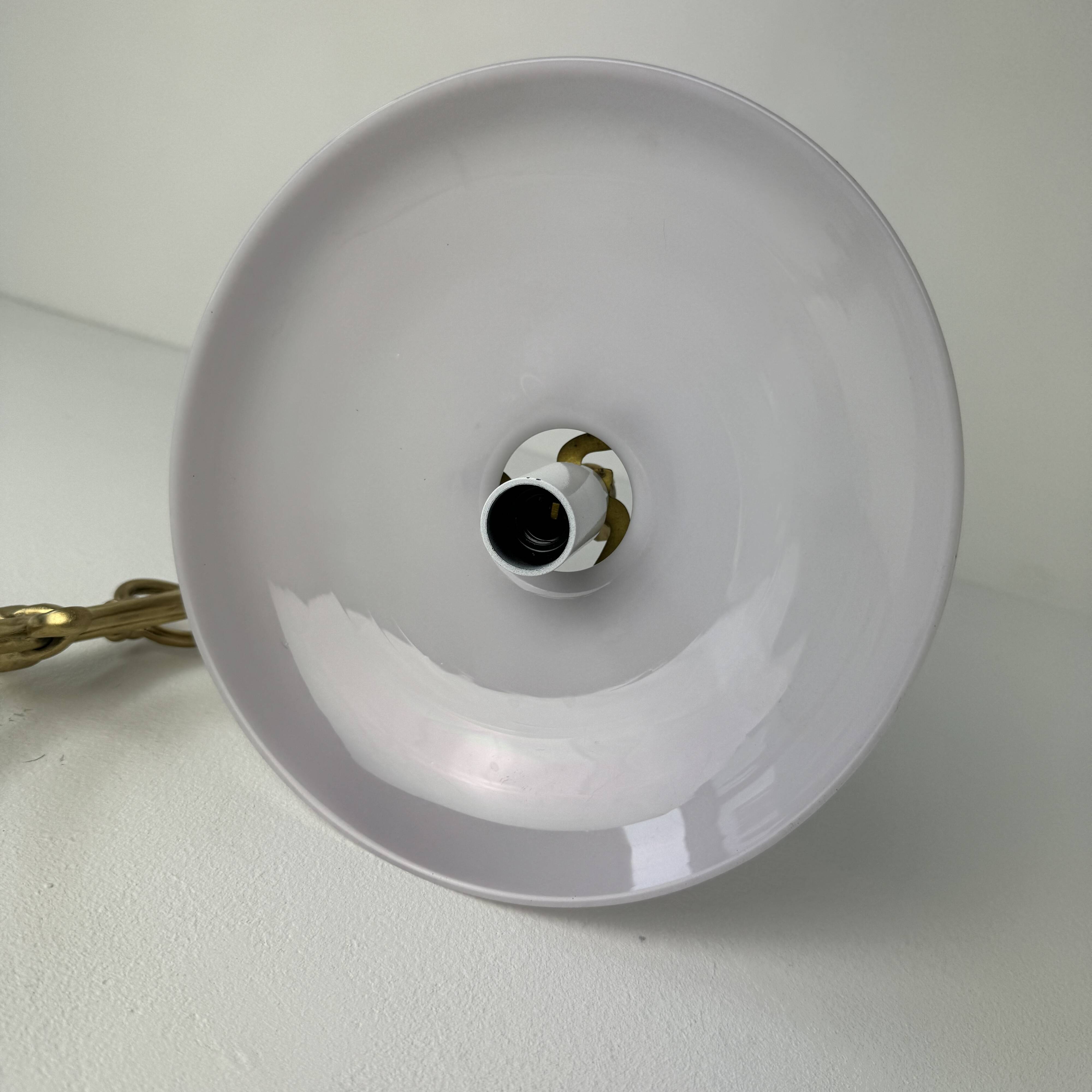 Vintage desk lamp that raises and lowers.