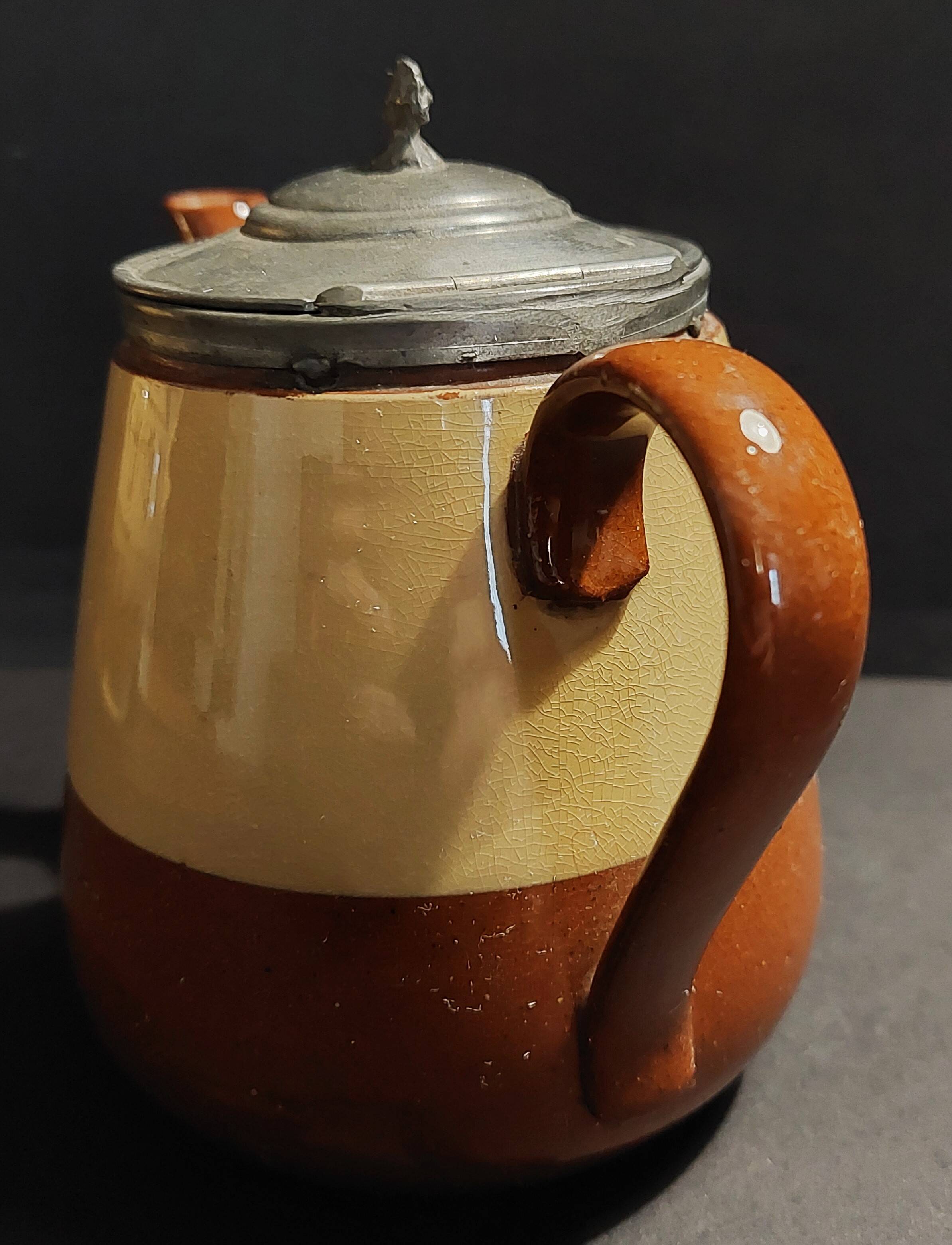 Beige and brown earthenware teapot with pewter lid, early 20th century