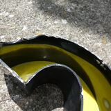 Letter C of yellow and black industrial sign