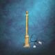 Large vintage brass lamp base in neoclassical column style with a copper socket.