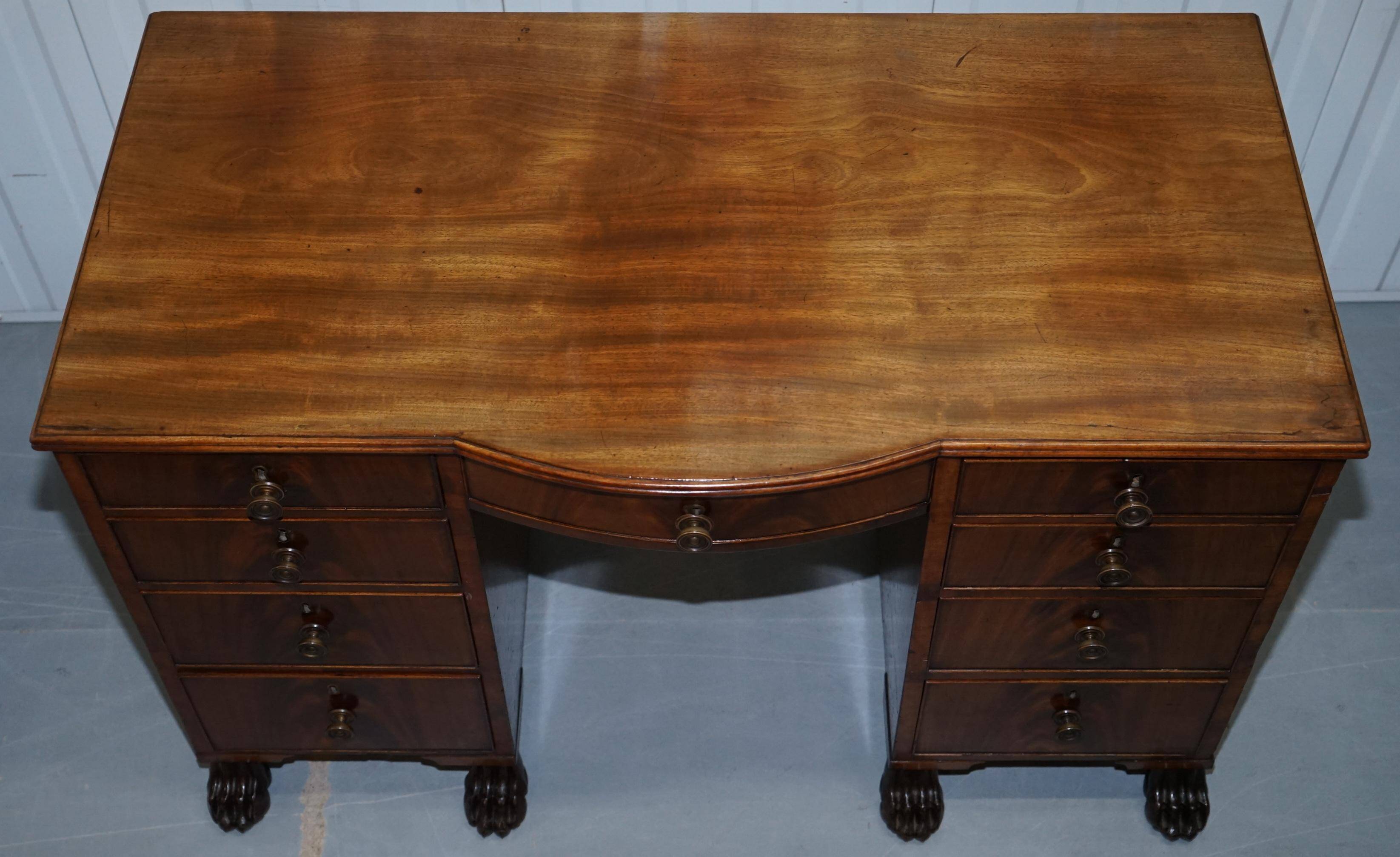 Kneehole Regency Desk 1815 in hardwood with lion paw feet
