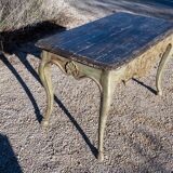 Console in patinated gray-green lacquered wood, molded and sculpted. Arched base on hooves.