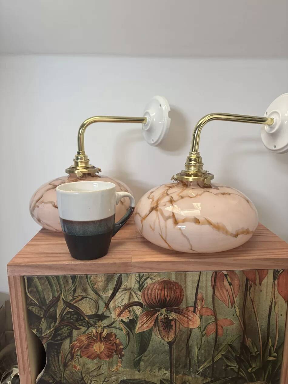 Pair of wall sconces in marbled opaline.