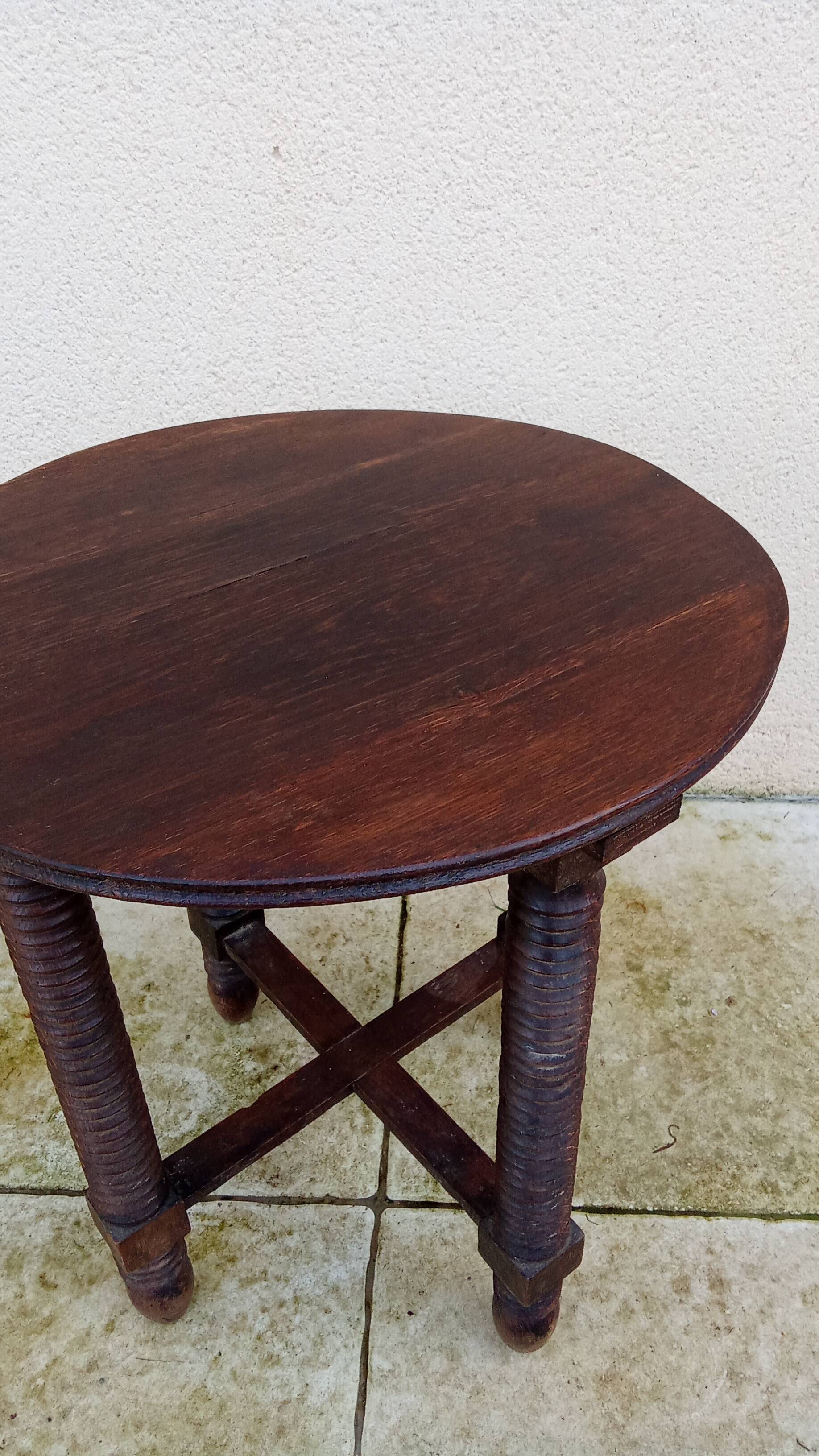 Old small round side table in Dudouyt style