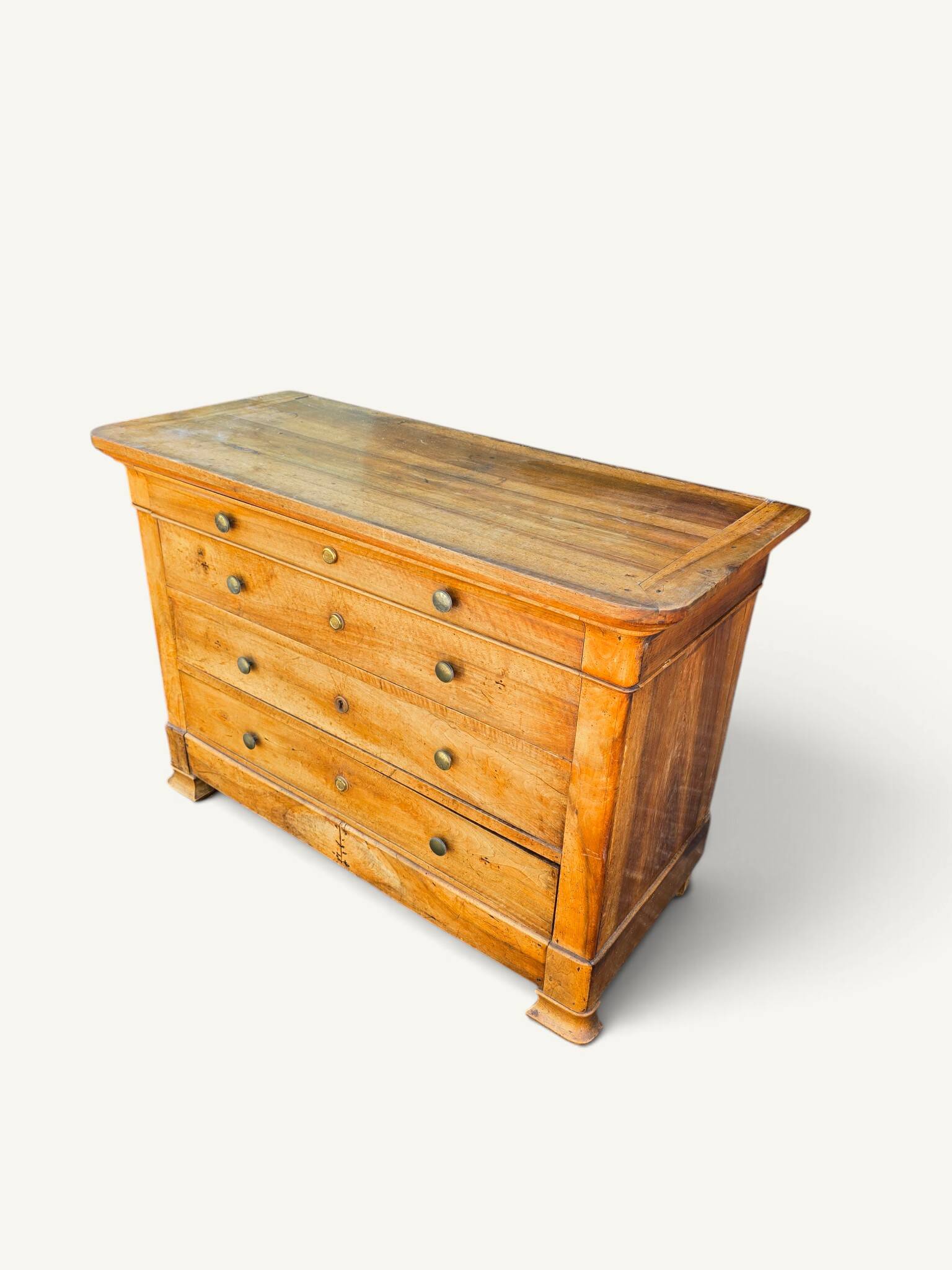 Commode Louis-Philippe en bois blond 4 tiroirs, XIXe