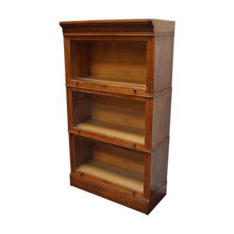 German oak bookcase with folding doors, ca 1900