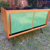 Sideboard with green sliding doors, circa 1950