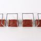 4 Matteo Grassi leather cogna cantilever armchairs