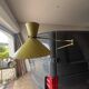 Diabolo wall lamp lunel yellow in the style of René Mathieu Guariche, star sheet metal.