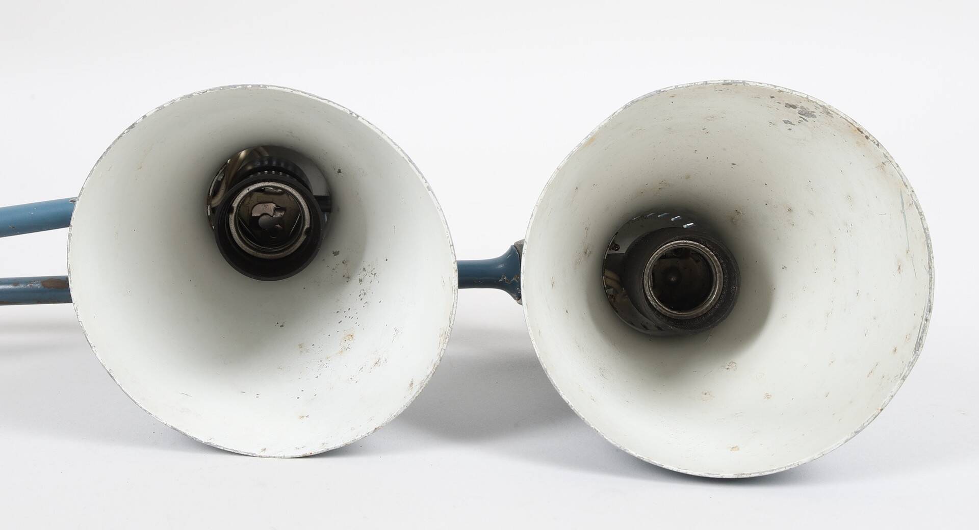 HANS BERGSTRÖM. A pair of blue lacquered metal wall lamps, Ateljé Lyktan